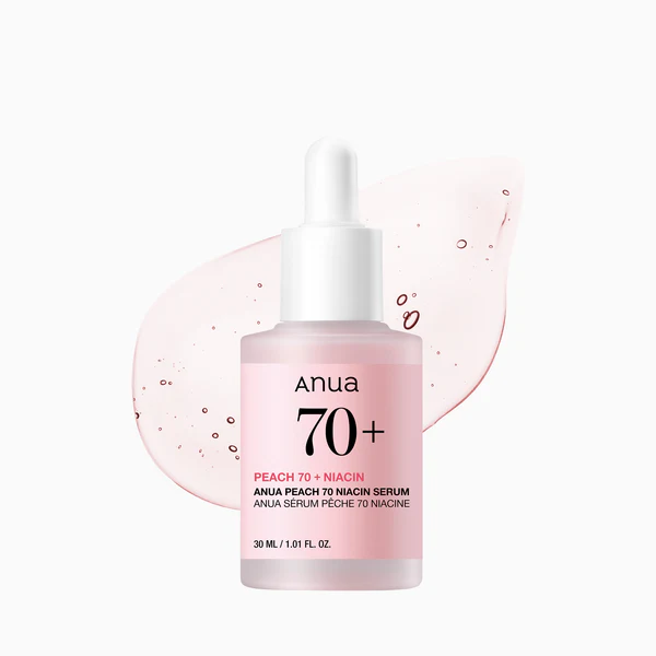 Anua Peach 70% Niacin Serum 30ml in pink-hued bottle, infused with peach extract, niacinamide, and hyaluronic acid for radiant skin.
